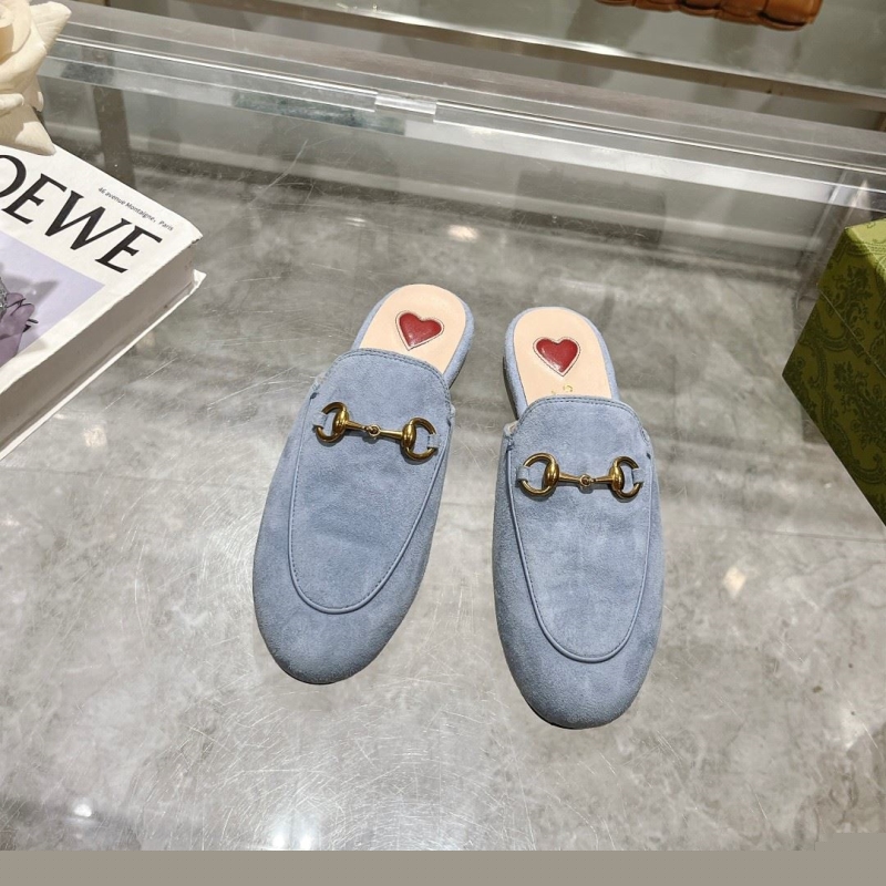 G*u*i slippers